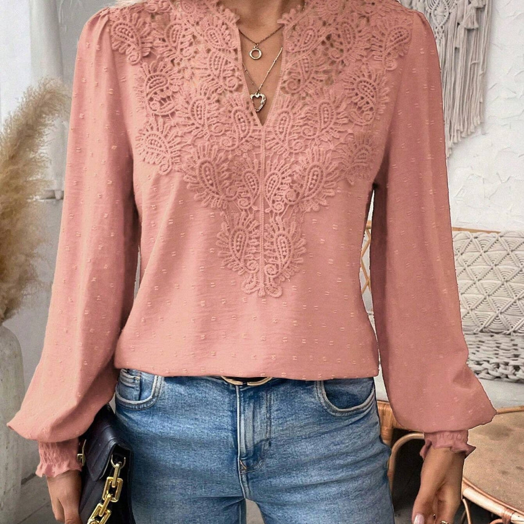 Elegant damebluse med løse ærmer
