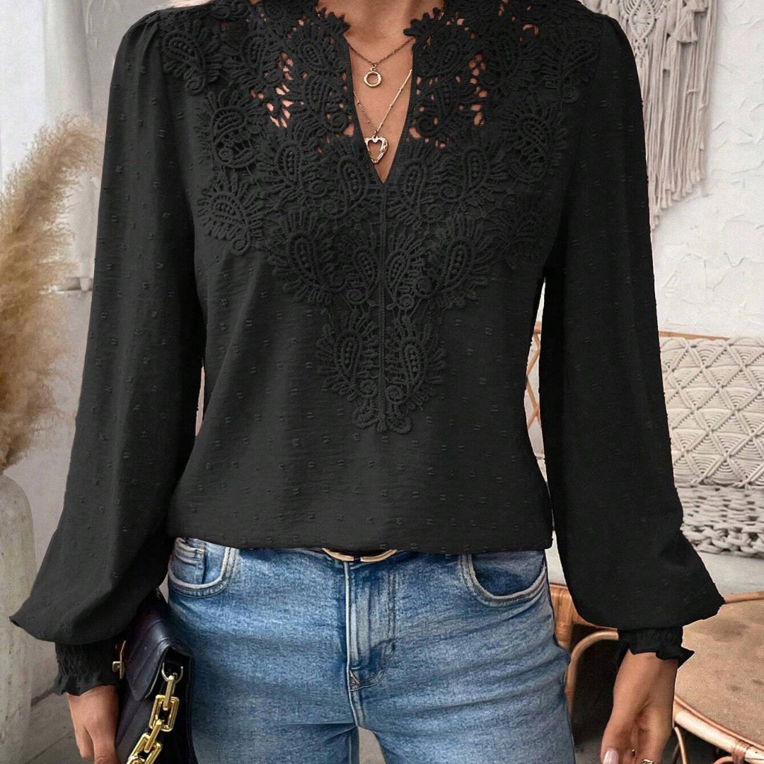 Elegant damebluse med løse ærmer