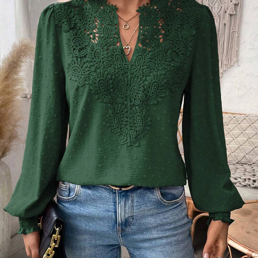 Elegant damebluse med løse ærmer