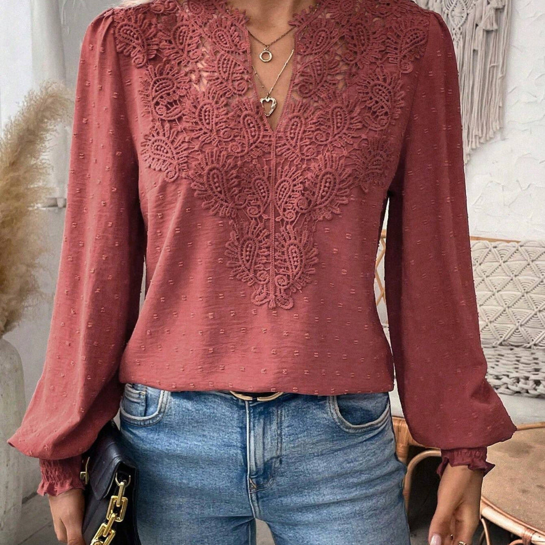 Elegant damebluse med løse ærmer