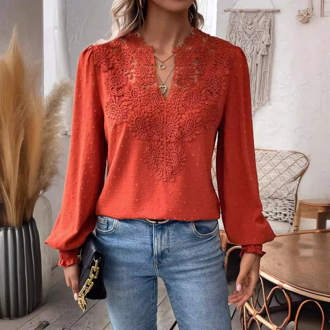Elegant damebluse med løse ærmer
