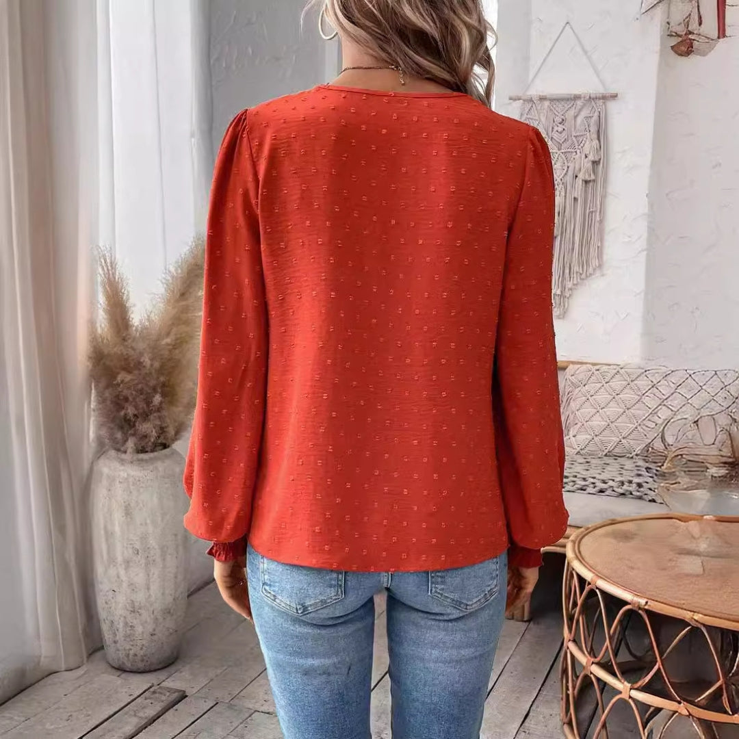 Elegant damebluse med løse ærmer
