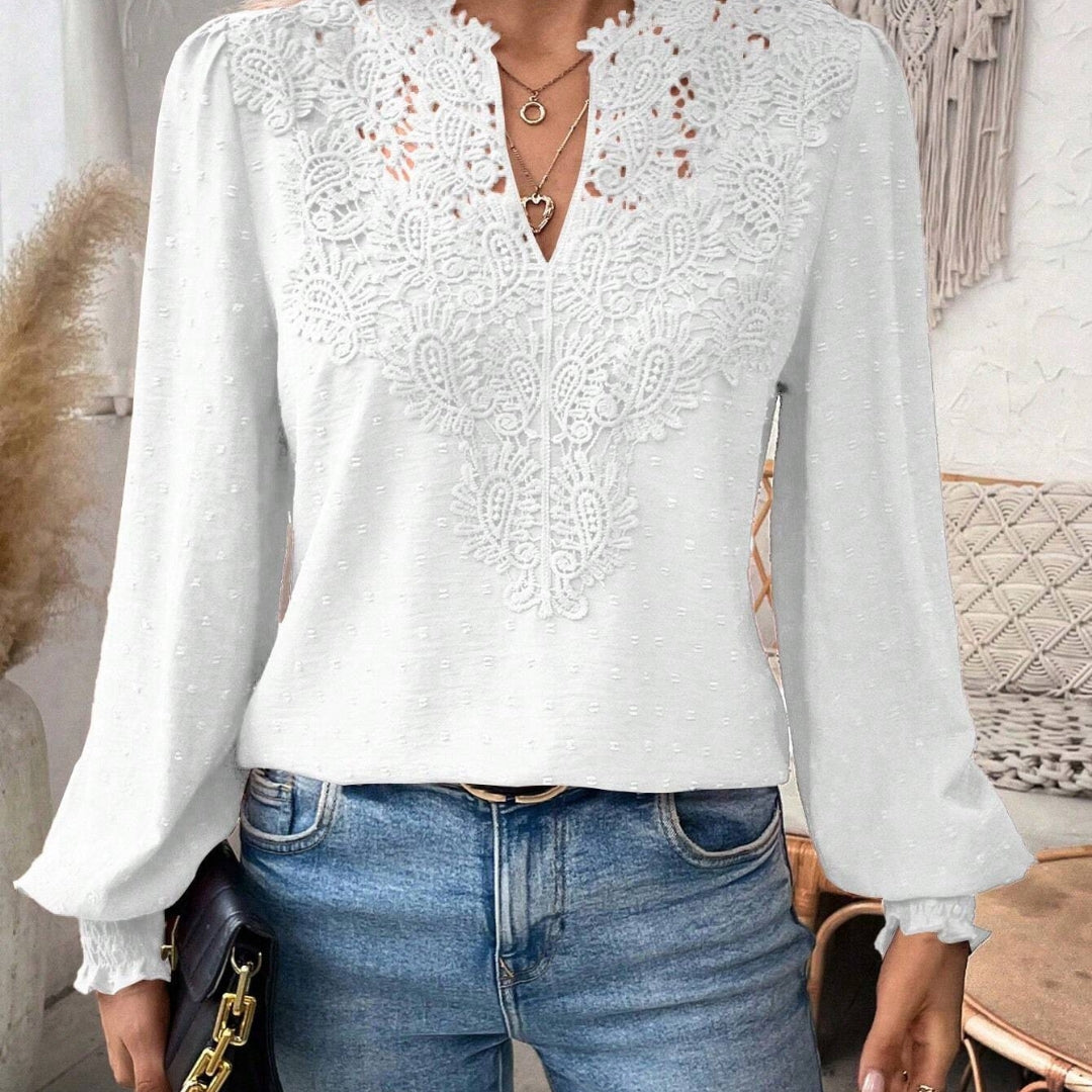 Elegant damebluse med løse ærmer